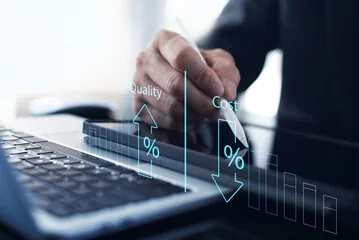 Hands at a laptop with rising quality and falling cost indicators, representing optimization