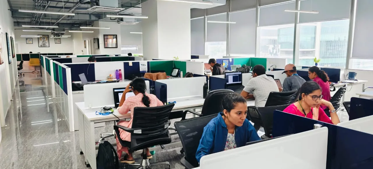 The Ameritechsoft team working at their workstations in the office